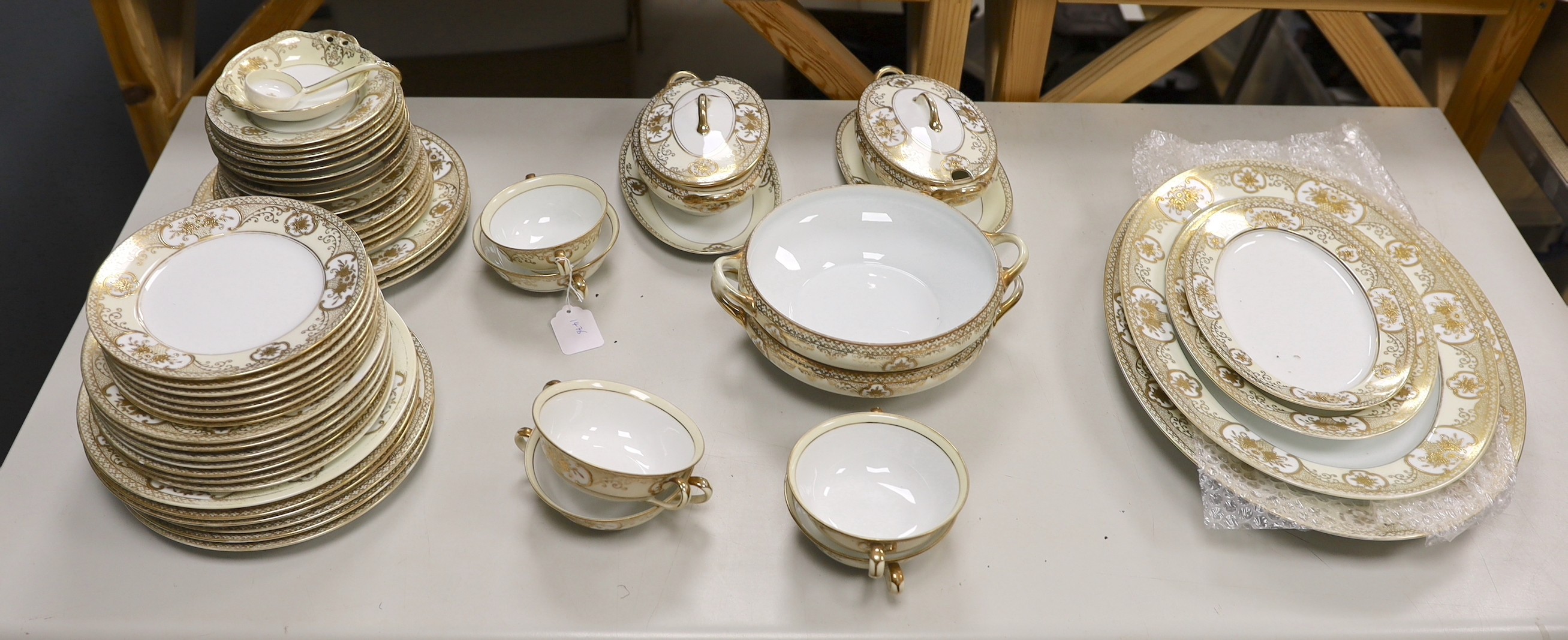 A Noritake gilt bordered dinner service